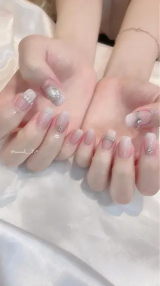 ネイル 𝘙𝘪𝘰𝘯𝘢 ...🕯🤍のネイルデザイン