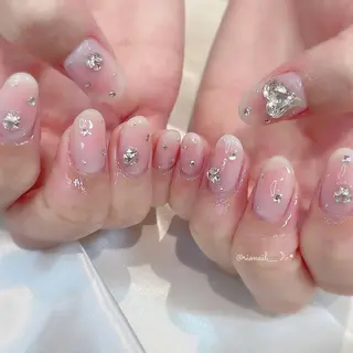 ネイル 𝘙𝘪𝘰𝘯𝘢 ...🕯🤍のネイルデザイン