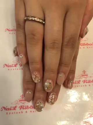 ネイル ネイルリボン 受付スタッフのネイルデザイン