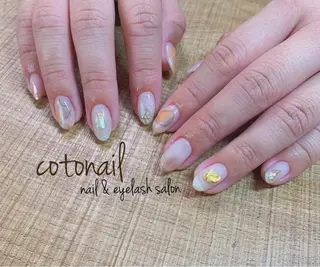 ミディアム ネイル ツメトマツゲ .のネイルデザイン