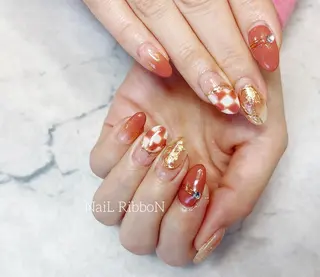 ネイル ネイルリボン 受付スタッフのネイルデザイン