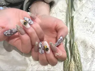 ロング m kaori𓃟のネイルデザイン