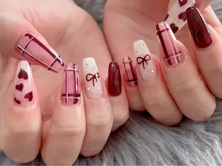 ミディアム Nina's nailのネイルデザイン