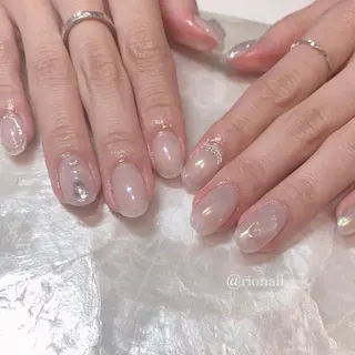 ネイル 𝘙𝘪𝘰𝘯𝘢 ...🕯🤍のネイルデザイン