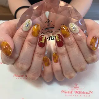 ネイル ネイルリボン 受付スタッフのネイルデザイン