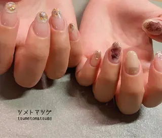 ミディアム ネイル ツメトマツゲ .のネイルデザイン