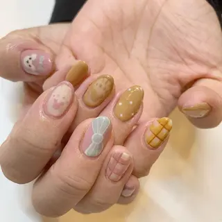 ネイル ヤマダ サクラのヘアスタイル