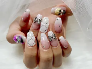 セミロング Conjunim MAMI🎀✨のネイルデザイン
