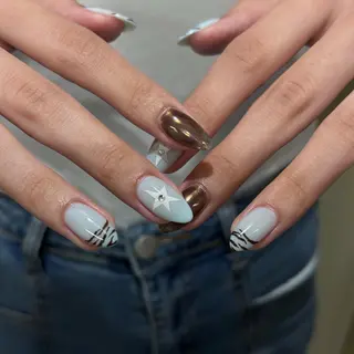 ミディアム minuit RIO🪽のネイルデザイン