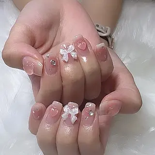 ネイル シュシュ 🎀 girly nailのネイルデザイン