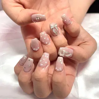 ネイル WOLTOKYO 🦋shizukuのネイルデザイン