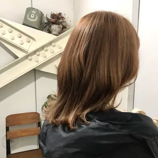 ミディアム 高津 千慧のヘアスタイル