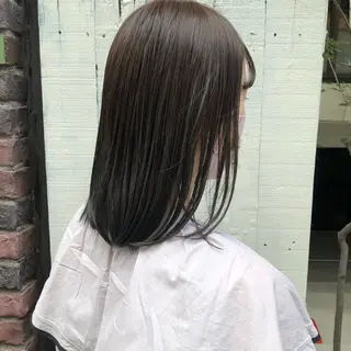 ミディアム 高津 千慧のヘアスタイル