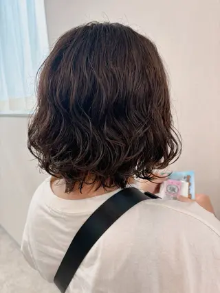ミディアム パーマ 角谷 靖子のヘアスタイル