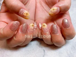 ネイル ネイルリボン 受付スタッフのネイルデザイン