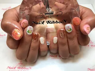 ネイル ネイルリボン 受付スタッフのネイルデザイン