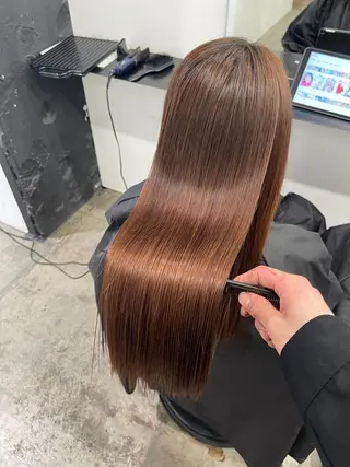 ロング パーマ TAKUMI .のヘアスタイル