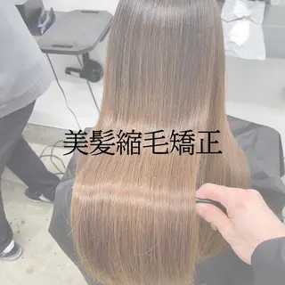 ロング パーマ TAKUMI .のヘアスタイル