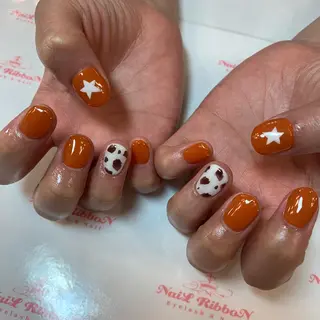 ネイル ネイルリボン 受付スタッフのネイルデザイン