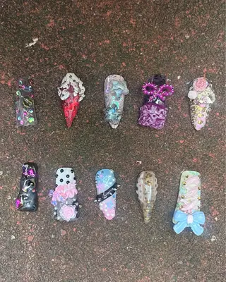 ネイル Mariris所属・ᗷᗩᑎSᗩ ᑎᗩIᒪ ՏᗩᒪOᑎのネイルデザイン