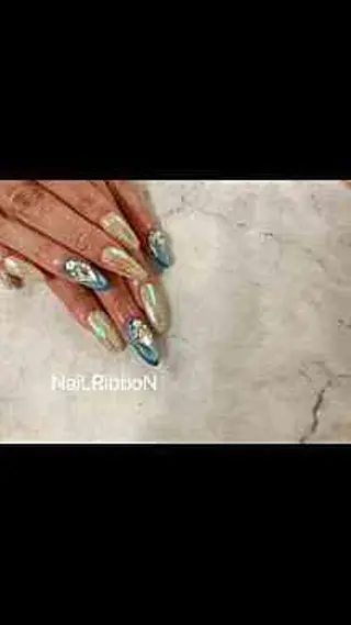 ネイル ネイルリボン 受付スタッフのネイルデザイン