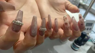 ロング ブラウン 広奈子のネイルデザイン