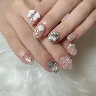 ネイル シュシュ 🎀 girly nailのネイルデザイン