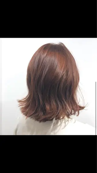 カラー 🟢ウルフ／スパイラ ルパーマ／大西🟢のヘアスタイル