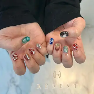 ネイル ❤️💛REBEST 京橋店のネイルデザイン