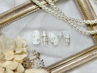 ネイル ネイルPetit Ribbonのネイルデザイン