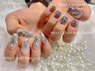 ネイル リボン、ガーリー パーツ放題専門店のネイルデザイン