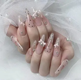 ロング パーマ ニュ クインのネイルデザイン