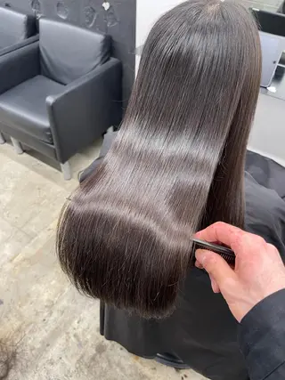 ロング パーマ TAKUMI .のヘアスタイル