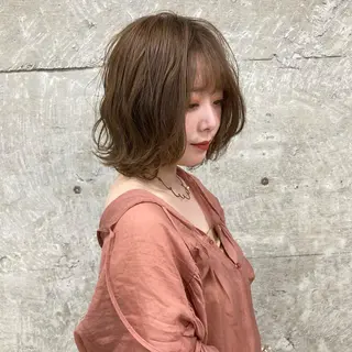 ミディアム 🟢ウルフ／スパイラ ルパーマ／大西🟢のヘアスタイル