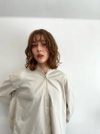 ミディアム パーマ 臺 佳連のヘアスタイル