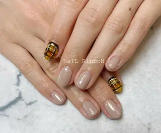 ネイル ネイルリボン 受付スタッフのネイルデザイン