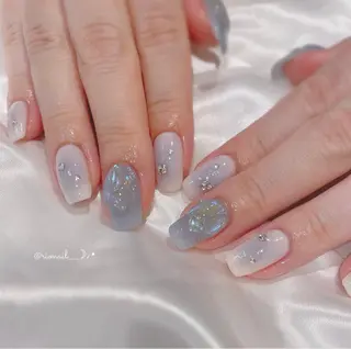 ネイル 𝘙𝘪𝘰𝘯𝘢 ...🕯🤍のネイルデザイン