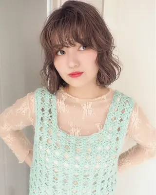 ショート パーマ レイヤーカット⭐️ ブリーチ桑原 日花理のヘアスタイル