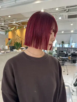 カラー MEY HAIR / CURLYS所属・カラー特化美容師 オレンジカラーのヘアスタイル