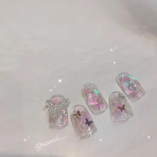 ネイル 𝘙𝘪𝘰𝘯𝘢 ...🕯🤍のネイルデザイン