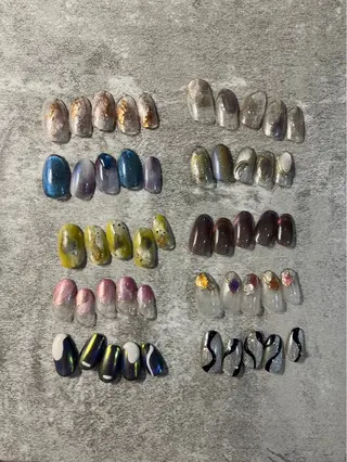 ネイル Mahiru ➰🎀🤍のネイルデザイン