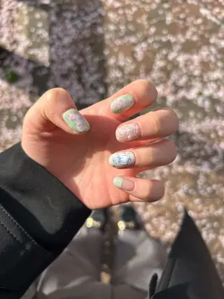 ネイル AMRITA omotesando所属・艶カラー・:*個性派 ネイル🦋mire-のネイルデザイン