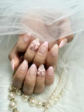 セミロング Conjunim MAMI🎀✨のネイルデザイン