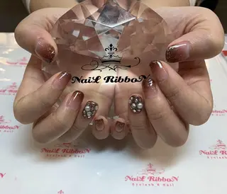 ネイル ネイルリボン 受付スタッフのネイルデザイン
