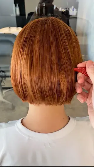 ショート け んブリーチ縮毛矯正のヘアスタイル