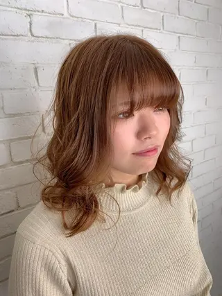 ミディアム u n aのヘアスタイル