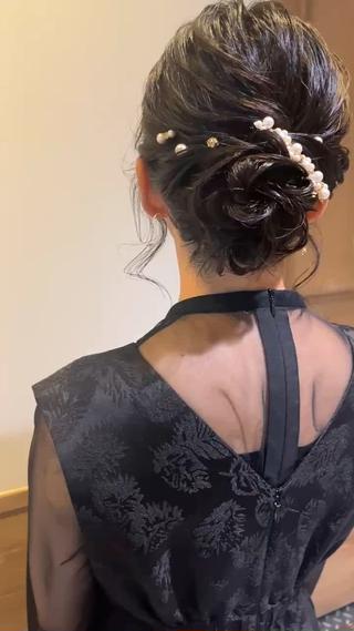 お客様の雰囲気に合わせて柔らかいふんわりとした
シニヨンヘア

 