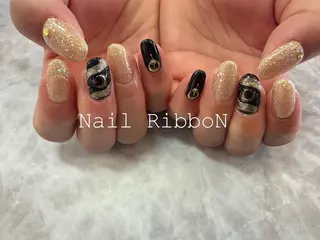 ネイル ネイルリボン 受付スタッフのマツエク・マツパデザイン