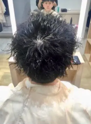 パーマ メンズ 牛尾 丈のヘアスタイル