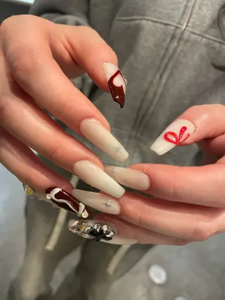 ロング m kaori𓃟のネイルデザイン